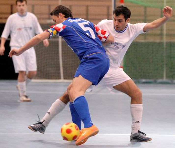 Úr leik í Futsal.