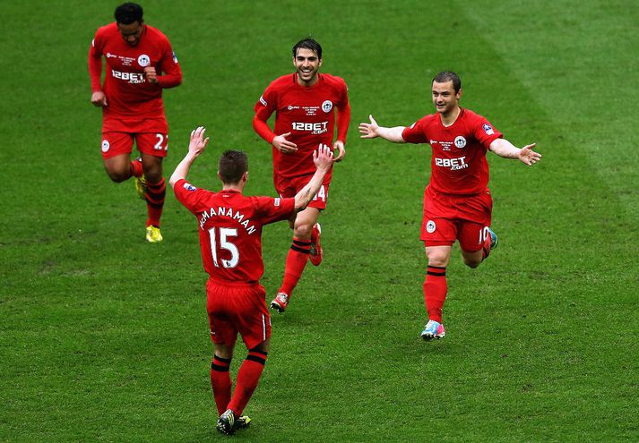 Leikmenn Wigan fagna í dag.