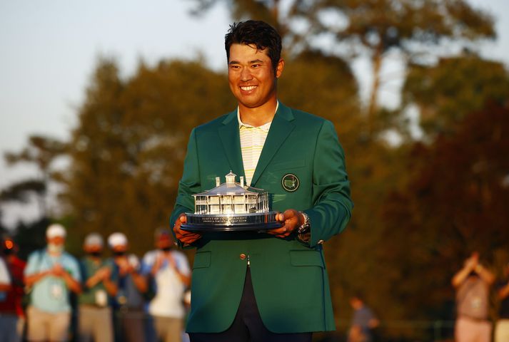 Hideki Matsuyama í græna jakkanum.