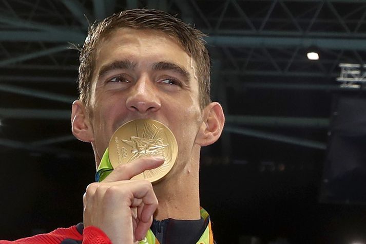 Michael Phelps er hér með ÓL-gull í Ríó. Verðlaunapeningarnir verða óhefðbundari næst.