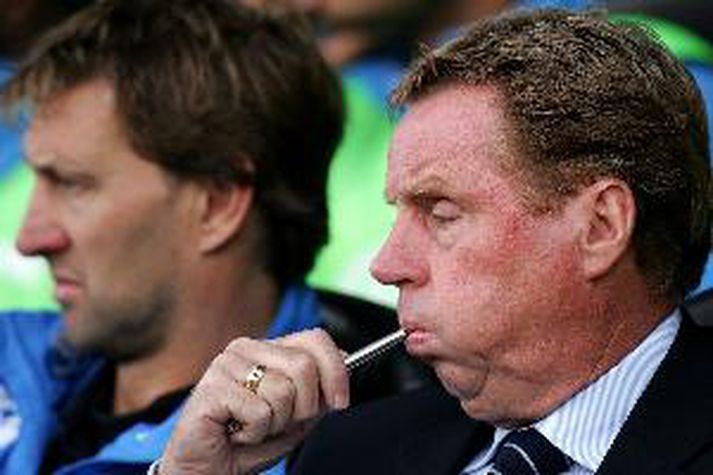 Redknapp er hér með Tony Adams, aðstoðarmanni sínum hjá Portsmouth. Hann sagði ljóst að Adams myndi ekki fylgja sér til Tottenham enda mikill Arsenal-maður.
