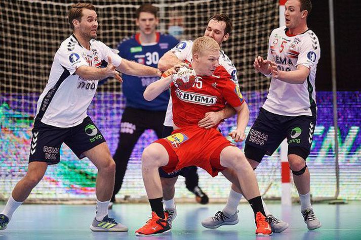 Denmark vs Norway - Testmatch KOLDING, DENMARK - JANUARY 07: Magnus Saugstrup challenge for the ball during the testmatch beween Denmark and Norway in Sydbank Arena on January 07, 2021 in Kolding, Denmark. (Photo by Jan Christensen / FrontzoneSport via Getty Images)