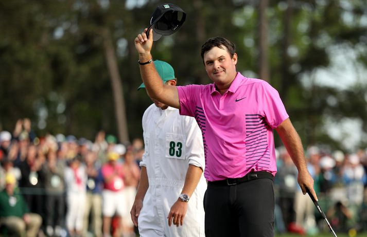 Patrick Reed fagnar sigri í dag.