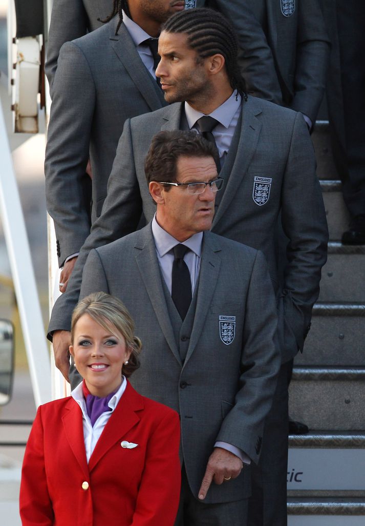 James ásamt Fabio Capello í flugvélinni á leið á HM.