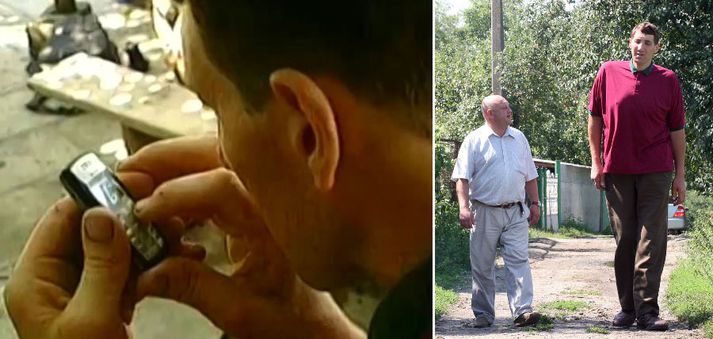 Stadnyk var talinn vera 253 sentímetrar á hæð. Hér stendur hann við hliðina á manni sem er um 180 sentímetrar.