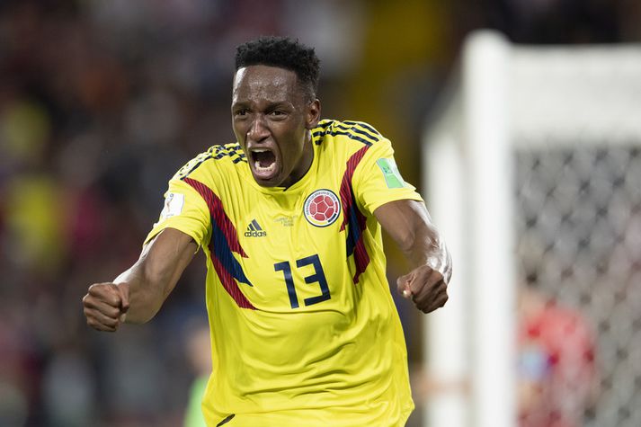 Yerry Mina fagnar hér marki á HM í Rússlandi í sumar.