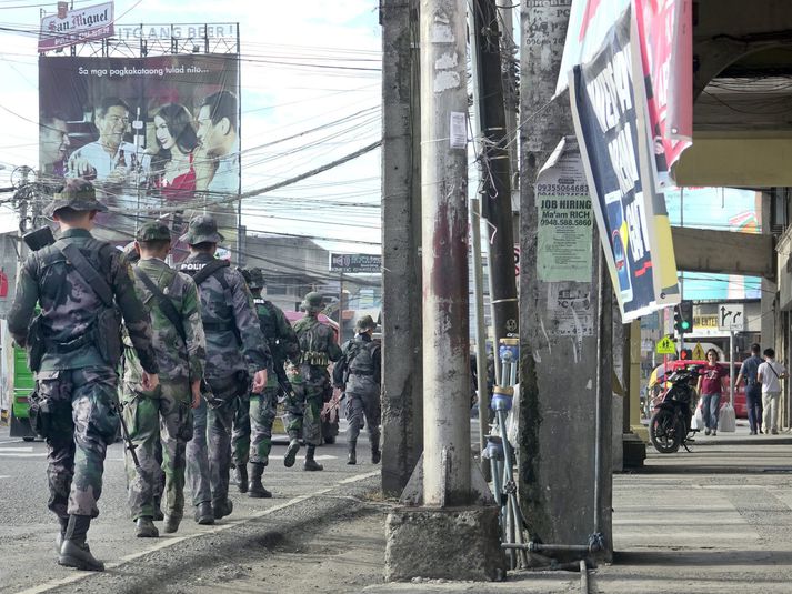 Herlögin gilda á eynni allri og eru hermenn sýnilegri en áður í stærstu borgum. Myndin er frá Davao þar sem Duterte var áður borgarstjóri. Duterte er þekktur fyrir að vera óvæginn í garð glæpamanna.