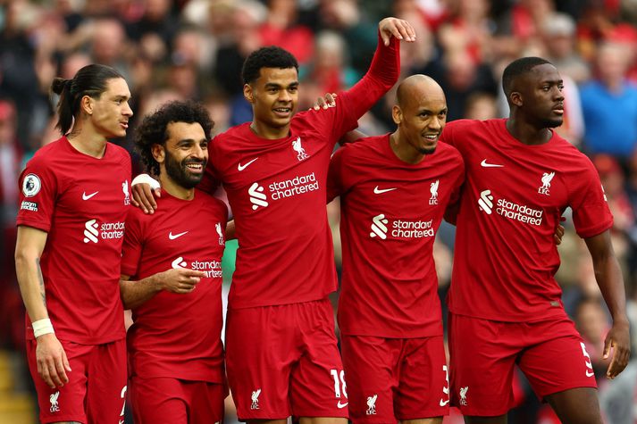 Leikmenn Liverpool fagna sigurmarki Salah í dag.