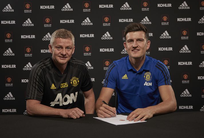 Harry Maguire og Ole Gunnar Solskjær.