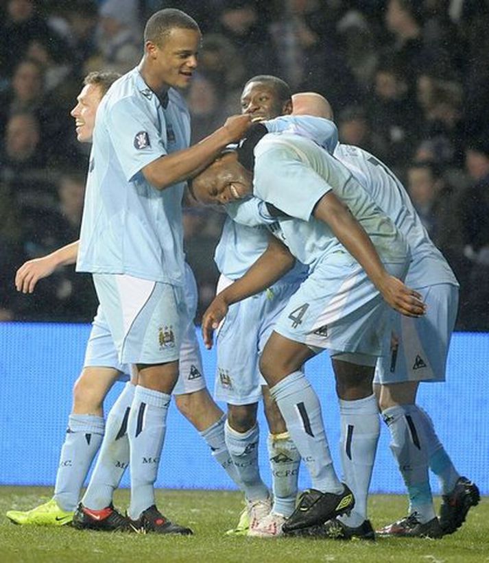 Leikmenn Manchester City fagna fyrra marki sínu í Kaupmannahöfn í kvöld.