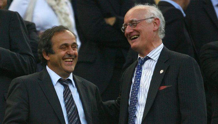 Buck ásamt Michel Platini, forseta UEFA.