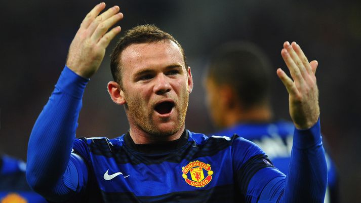 Wayne Rooney fagnar í gær.