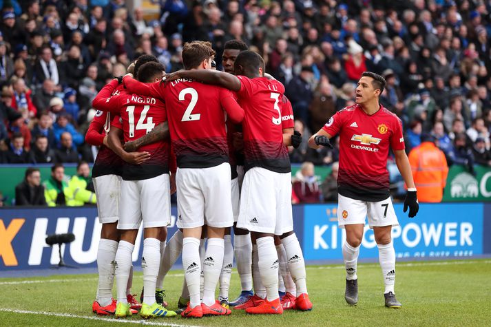 Leikmenn United fagna sigurmarki Rashford.