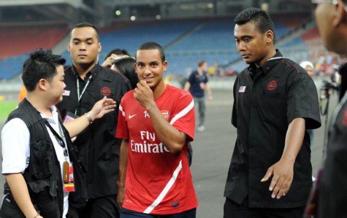 Walcott er staddur í Kína þessa stundina með Arsenal.