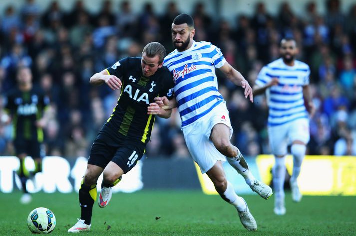 Caulker í baráttunni við Kane á síðasta tímabili.