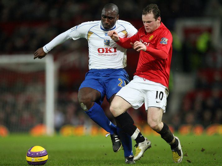 Sol Campbell og Wayne Rooney.