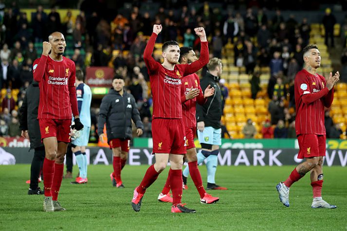 Leikmenn Liverpool fagna sigrinum gegn Norwich um helgina.