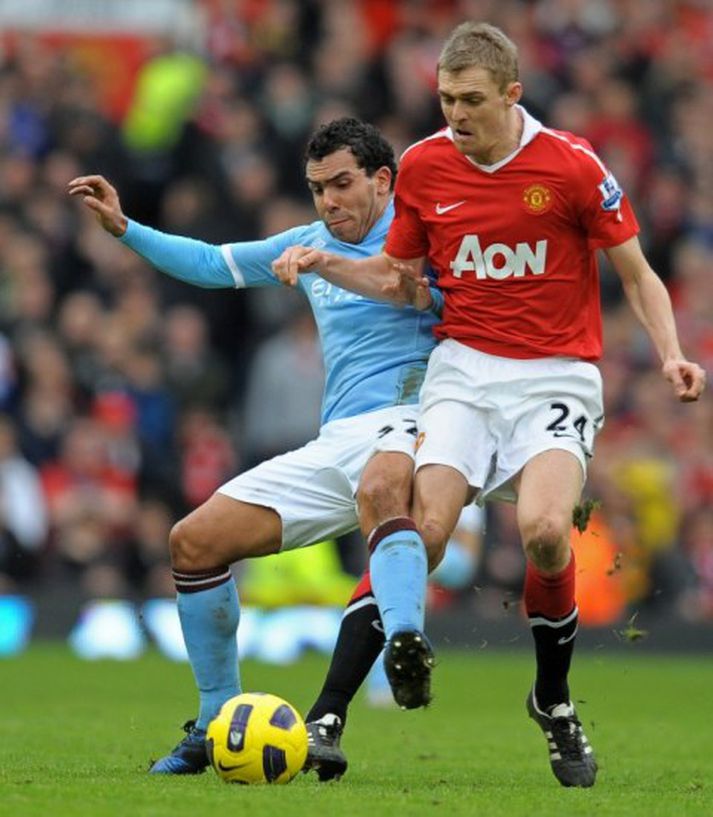 Fletcher í baráttunni við Tevez.