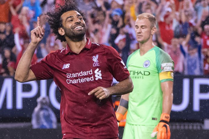 Mohamed Salah raðaði inn mörkum fyrir Liverpool á síðasta tímabili og Ruud Gullit spáir því að hann verði enskur meistari næsta voru.