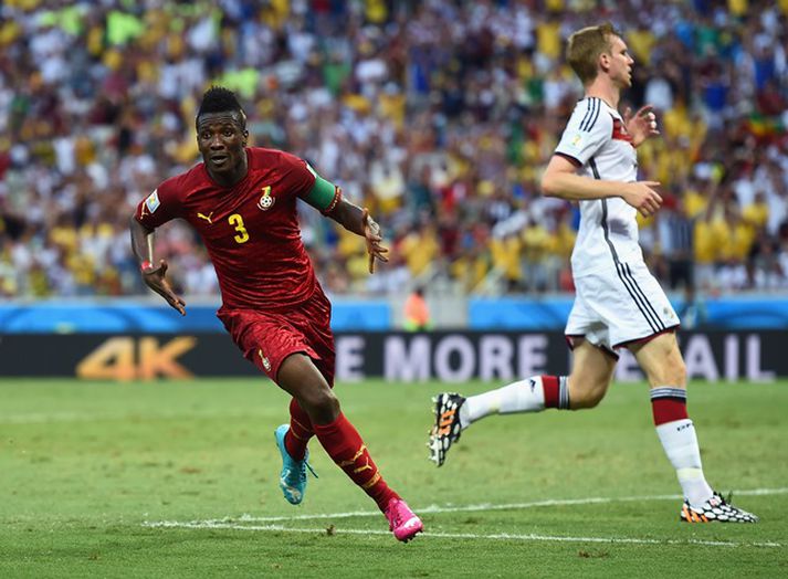 Asamoah Gyan fagnar marki sínu gegn Þýskalandi á HM í sumar.