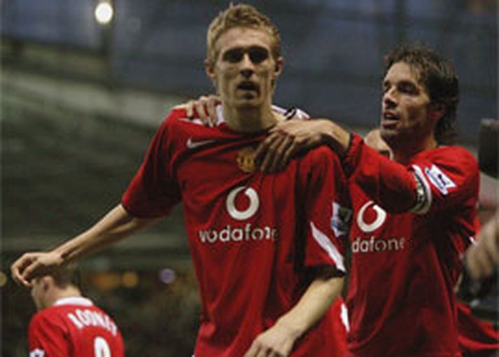 Darren Fletcher fagnar hér sigurmarki sínu ásamt Ruud van Nistelrooy