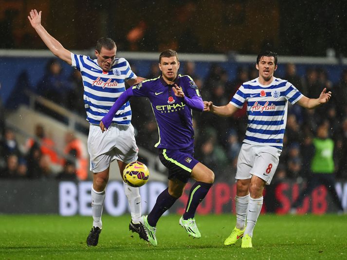 Dzeko í leiknum gegn QPR þar sem hann meiddist.