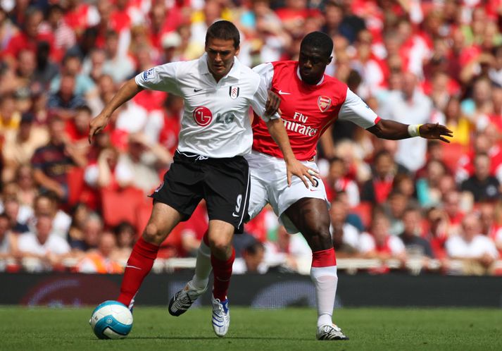 David Healy skoraði í sínum fyrsta leik fyrir Fulham í dag. Hér er hann í baráttu við Kolo Toure