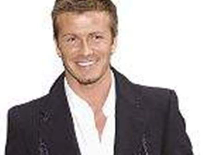 Martröð David Beckham segir það stundum martröð líkast að snæða úti með Tom Cruise og frú.
