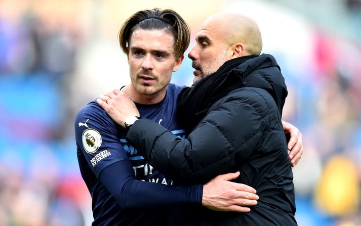 Jack Grealish og Pep Guardiola eftir sigurleik Manchester City á móti Burnley í ensku úrvalsdeildinni um síðustu helgi.