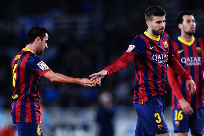 Gerard Pique og Xavi.