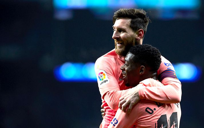Ousmane Dembele og Lionel Messi.