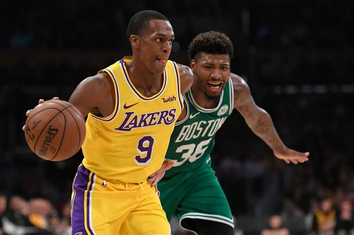 Rajon Rondo í leik með Los Angeles Lakers á móti hans gömlu félögum í Boston Celtics. Hann varð meistari með báðum félögum.