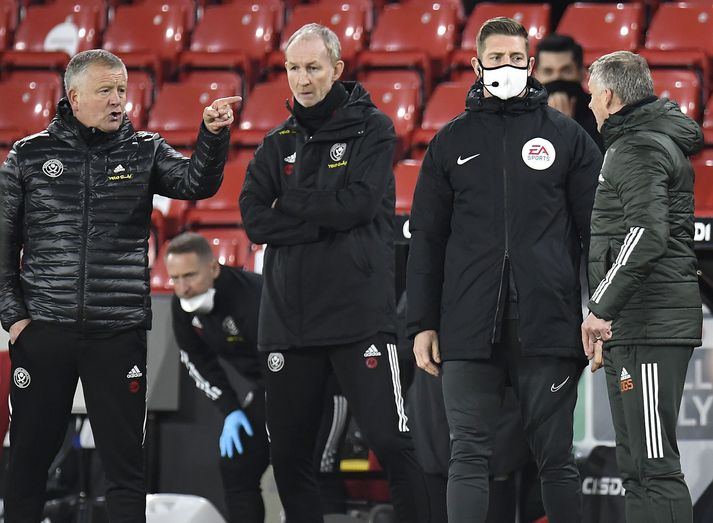 Chris Wilder og Ole Gunnar Solskjær létu hvorn annan heyra það á hliðarlínunni.