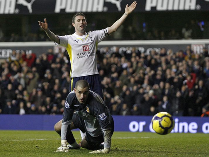 Boaz Myhill er hér búinn að verja frá Robbie Keane úr góðu færi.