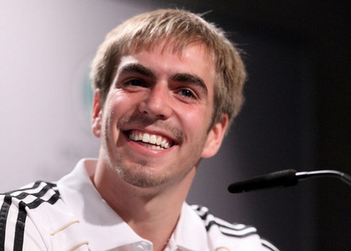 Philipp Lahm var brosmildur á blaðamannafundinum í dag.