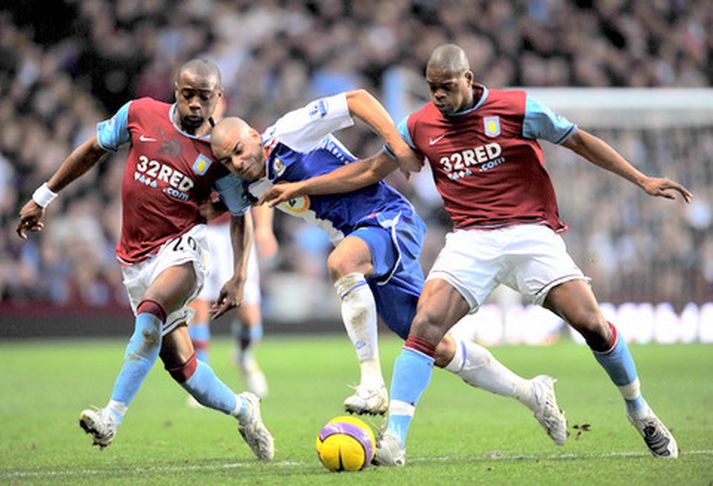 Marlon Harewood og Nigel Reo-Coker reyna hér að stöðva Steven Reid, leikmann Blackburn.
