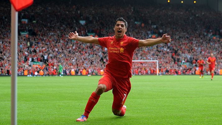 Luis Suarez fagnar hér marki sínu sem hann skoraði fyrir Liverpool um helgina.