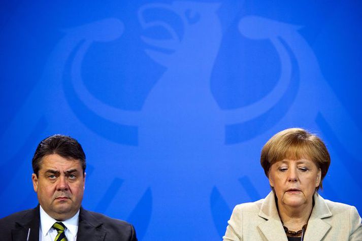 Sigmar Gabriel og Angela Merkel, leiðtogar þýsku stjórnarflokkanna.
