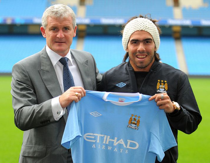 Mark Hughes og Carlos Tevez.