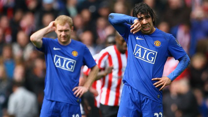 Paul Scholes og Carlos Tevez.