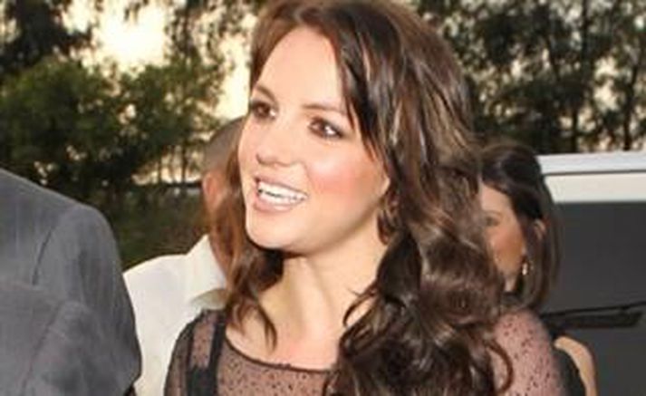 Britney sat fáklædd fyrir á myndum. Mynd/ AFP.