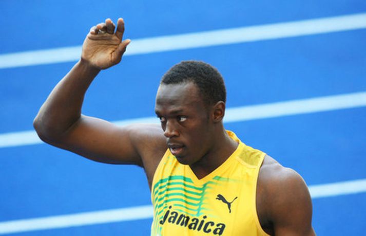 Usain Bolt í Berlín í morgun.