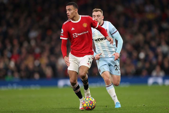 Manchester United v West Ham United - Premier League MANCHESTER, ENGLAND - JANUARY 22: Mason Greenwood of Manchester United battles for possession with Jarrod Bowen of West Ham United during the Premier League match between Manchester United and West Ham United at Old Trafford on January 22, 2022 in Manchester, England. (Photo by Naomi Baker/Getty Images)