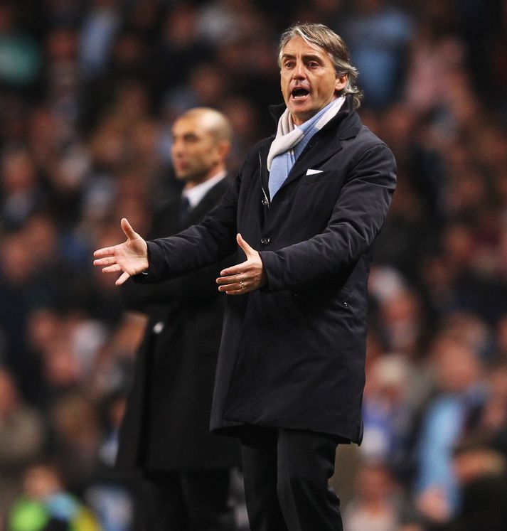 Stjórar Man. City og Chelsea.
