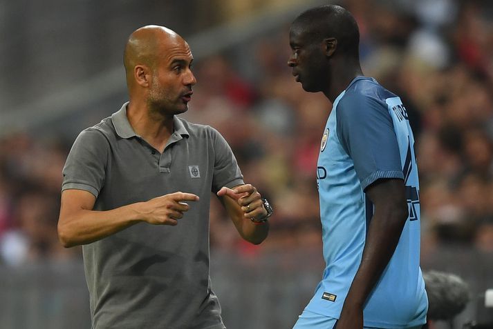 Pep Guardiola og Yaya Toure.