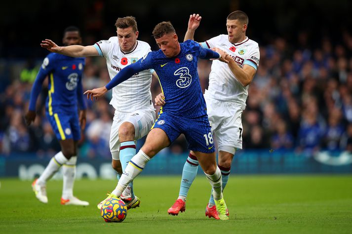 Chris Wood og Jóhann Berg Guðmundsson í baráttunni gegn Burnley.