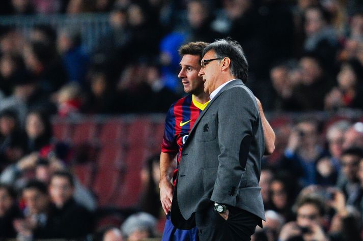 Lionel Messi ræðir við Gerardo 'Tata' Martino þegar þeir unnu saman hjá Barcelona.