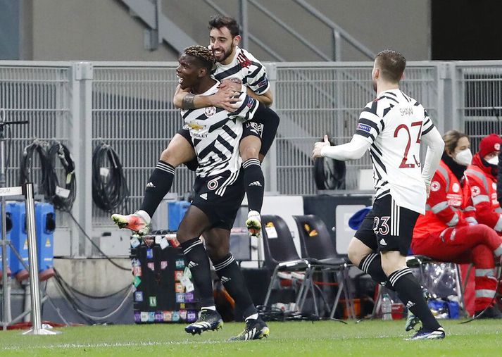 Paul Pogba skoraði markið sem skilaði Manchester United í 8-liða úrslitin, í 1-0 sigrinum gegn AC Milan í gær.