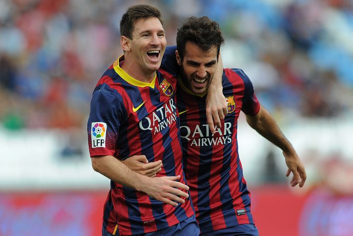 Lionel Messi og Cesc Fabregas fagna saman marki með Barcelona.