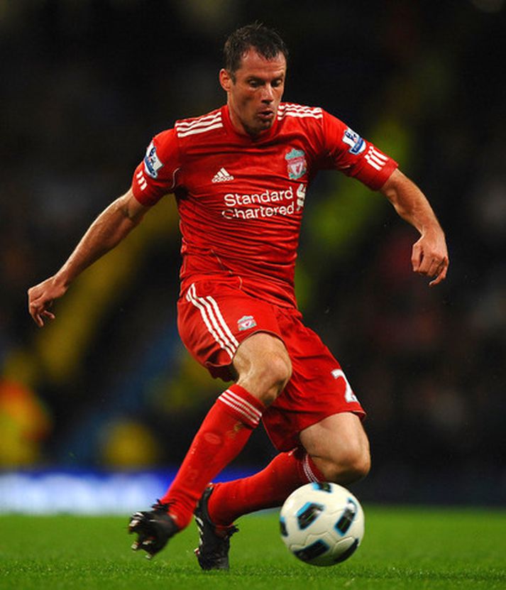 Jamie Carragher í leik með Liverpool.